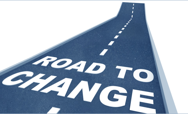 Road graphic with "Road to Change" written on it