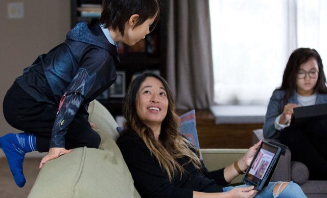 Joyce Chen at home with her son and daughter
