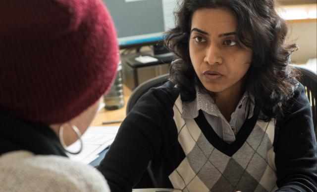 Woman of color faculty member mentoring student