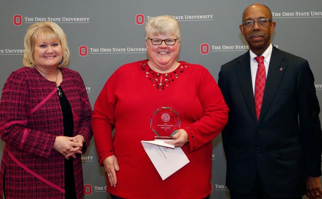 Award recipient with President Drake