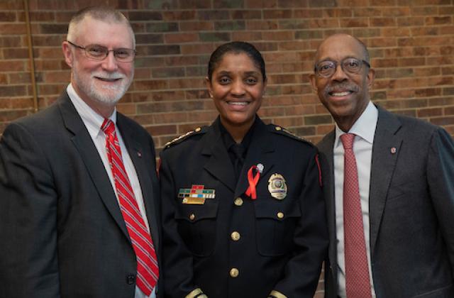 Provost, Police Chief, and President posing for photo