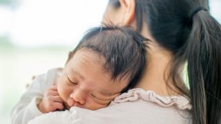 Woman holding baby