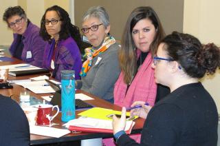 Women sitting in a meeting